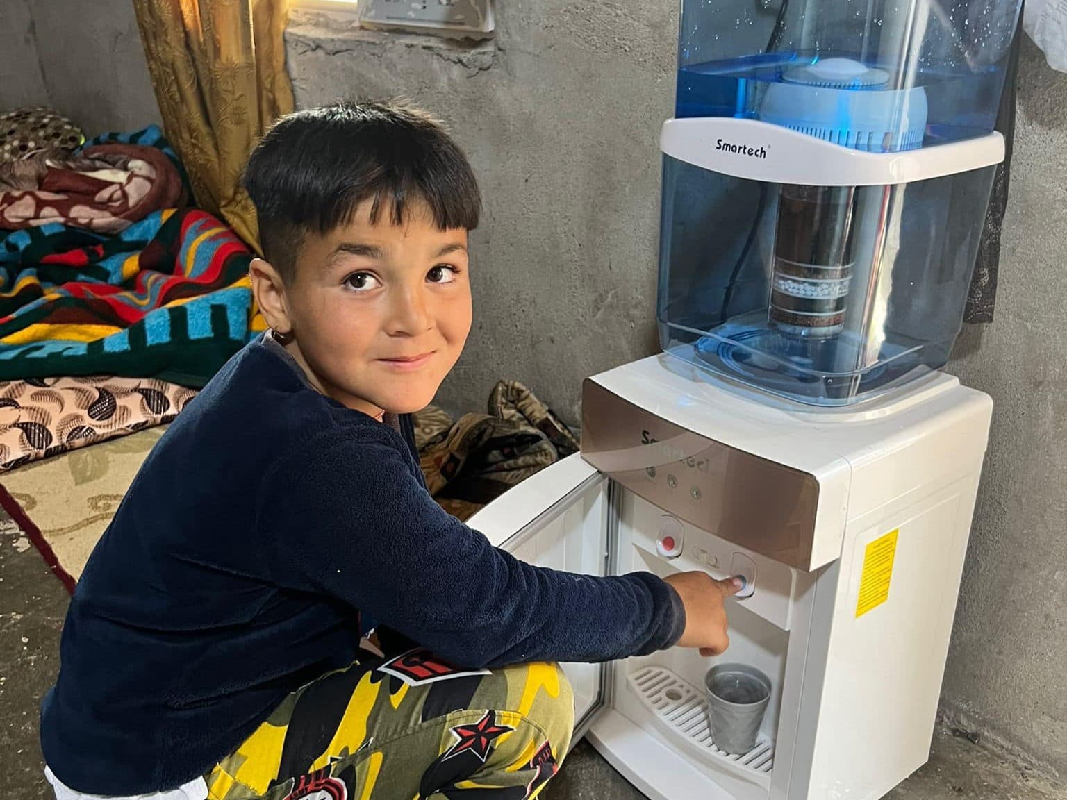 Water Dispensers for Families in Camps